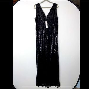 Black sequin floor length gown. V-neck front and back. Never worn.